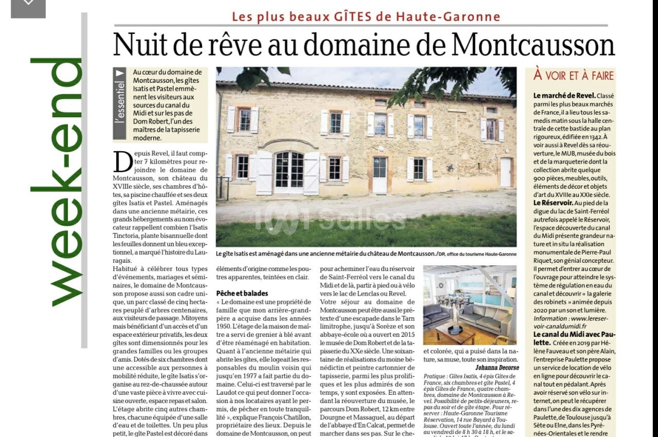 Une maison en pierre avec des volets bleus entourée d'un jardin, illustrant un article sur un gîte en Haute-Garonne.