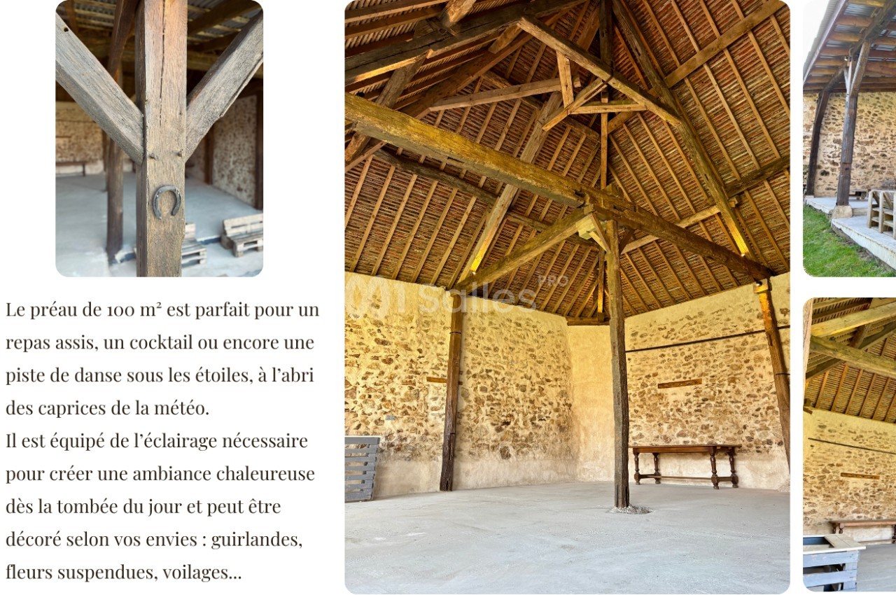 Charpente en bois apparente d'un préau spacieux en pierre, éclairé naturellement, avec un sol en béton lisse.