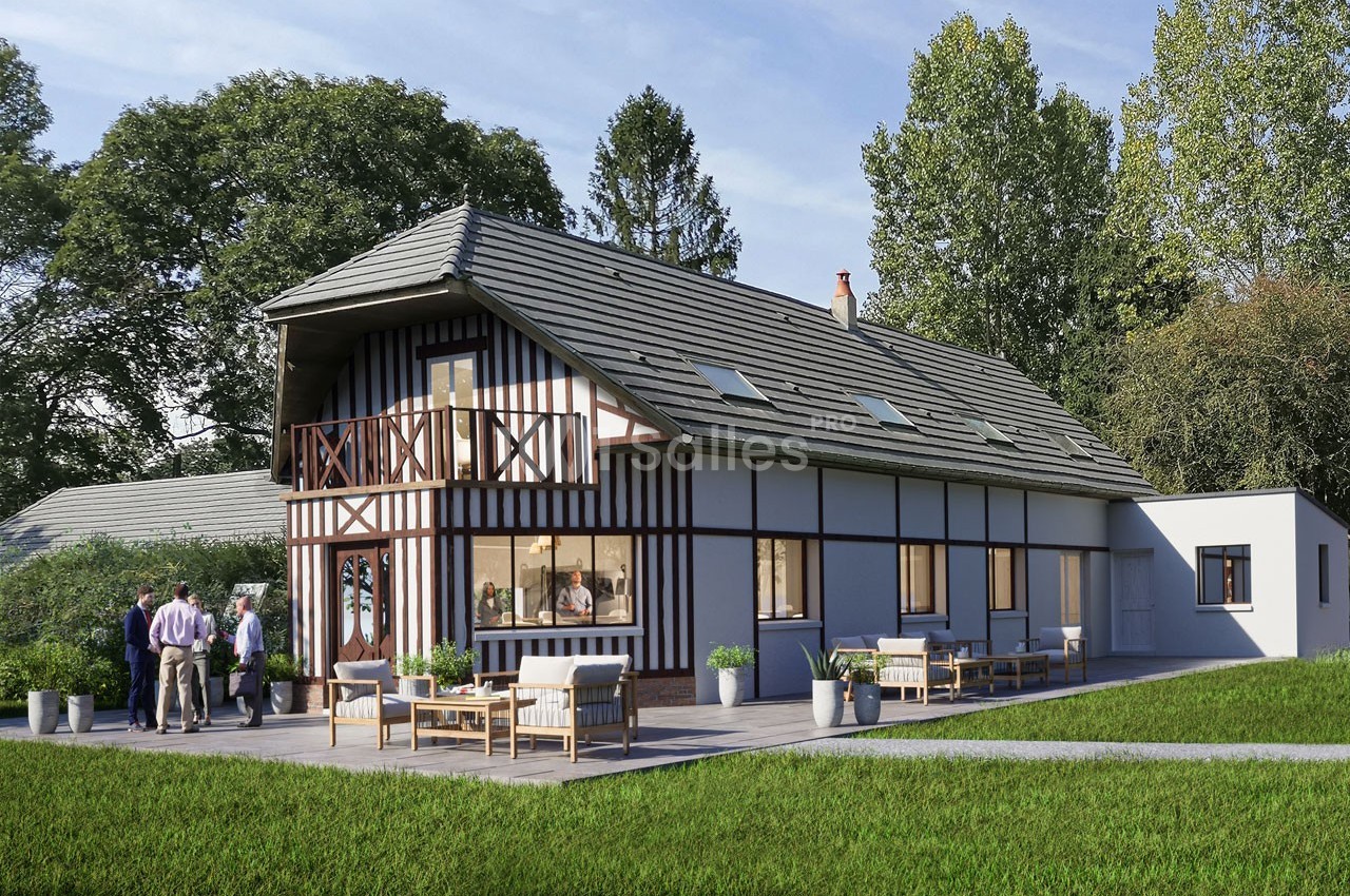 Maison à colombages moderne avec terrasse aménagée, entourée de pelouse et d'arbres, avec un groupe de personnes discutant.