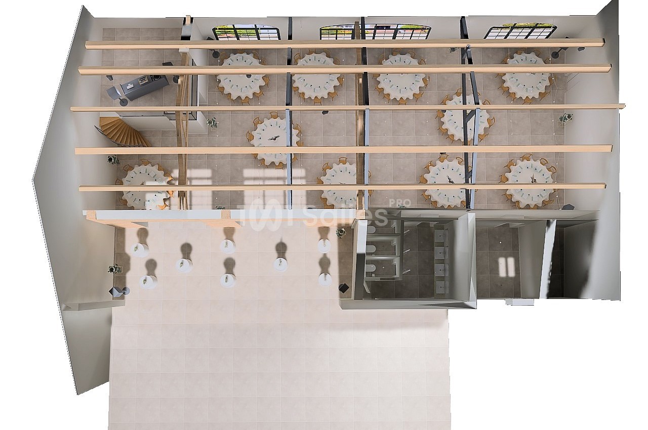 Vue en plongée d'un plan d'aménagement intérieur avec tables rondes, chaises, et espaces délimités par des cloisons.